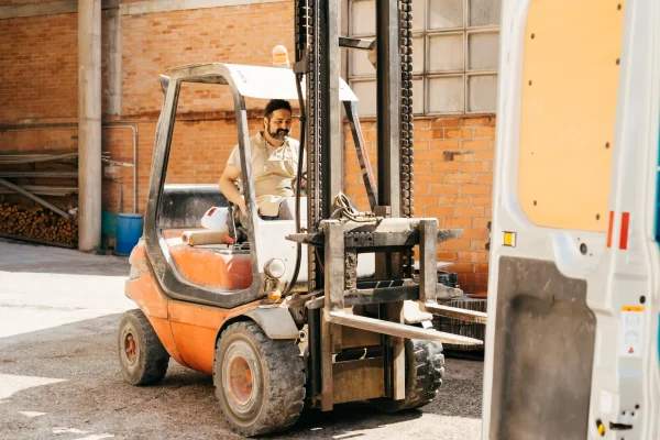 man-operating-forklift-at-industrial-warehouse-dur-2024-06-13-05-39-05-utc